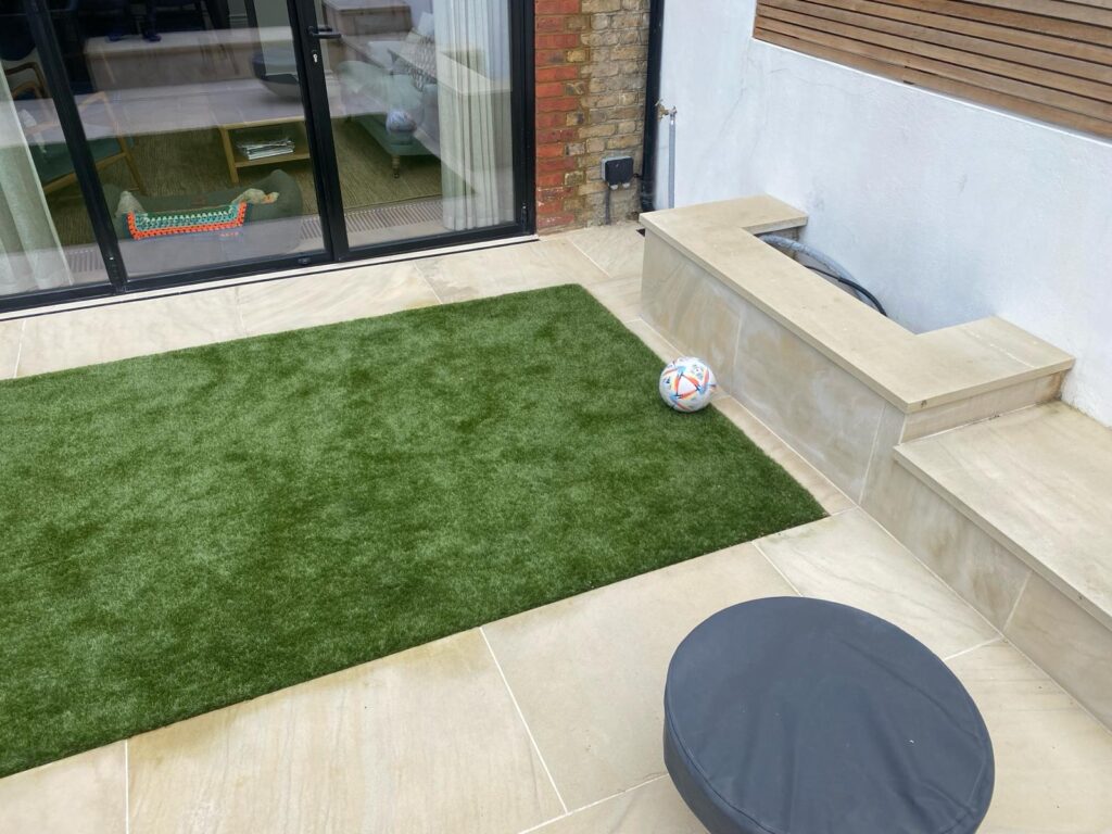 Quarrendon Street Fulham London SW6- New garden design including shed-trellis-stone work-bespoke planters and walking on sky light